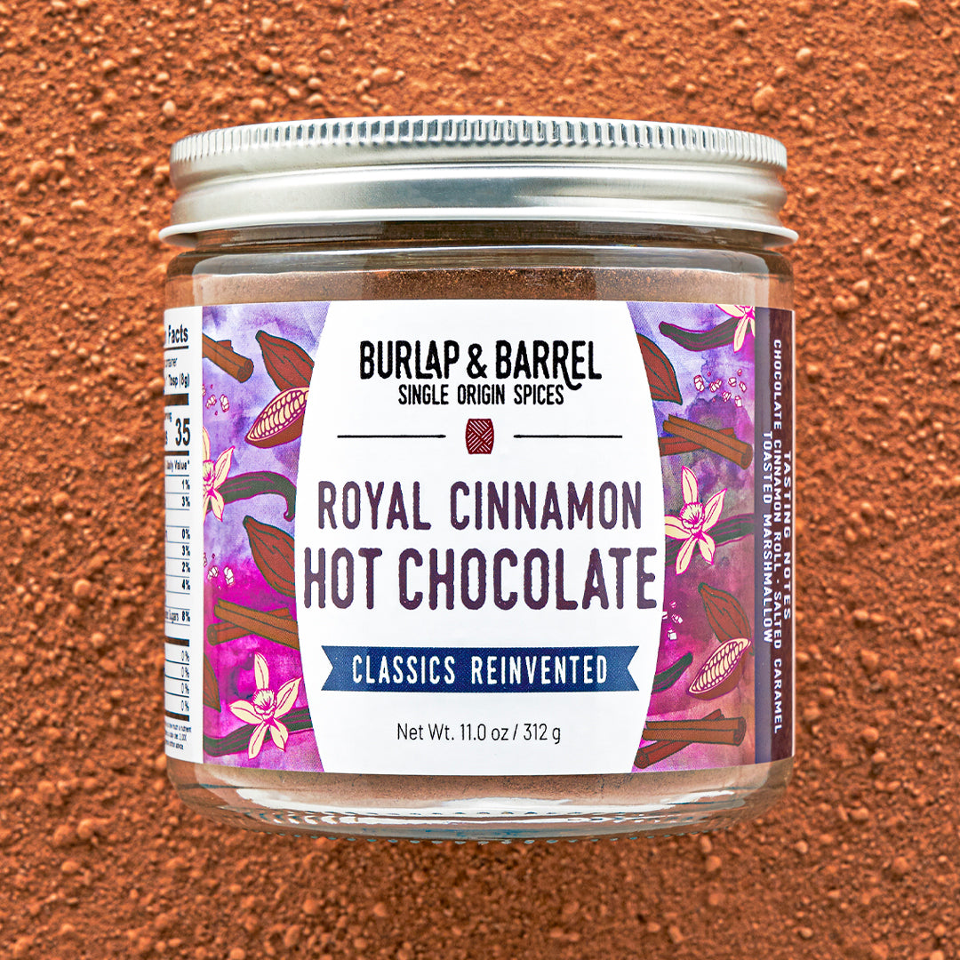 Jar of Burlap & Barrel Royal Cinnamon Hot Chocolate on a brown background