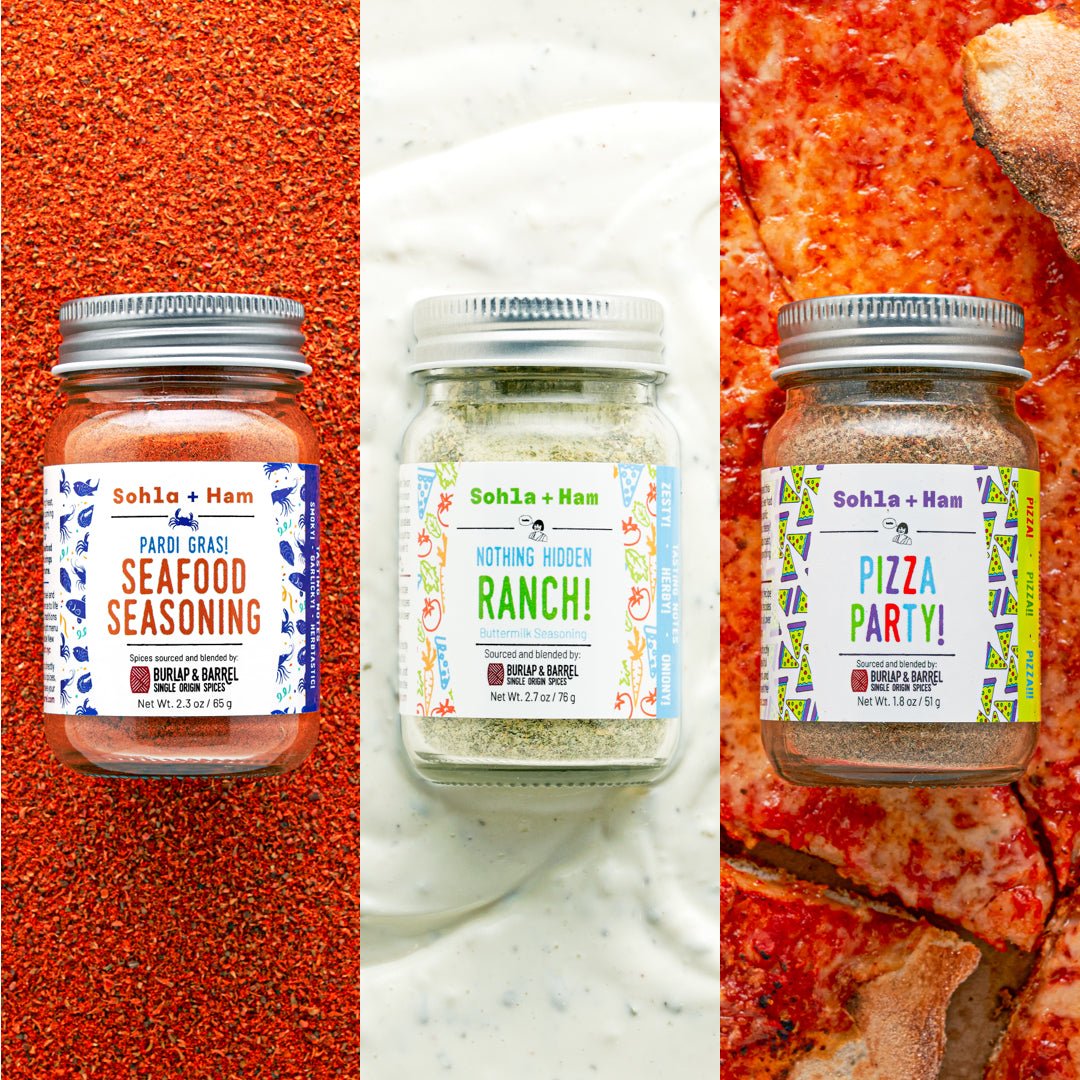Three jars of Sohl & Ham seasoning on a pizza, bread, and ranch background