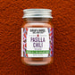 Jar of Burlap & Barrel Pasilla Chili on a textured brown background