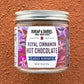 Jar of Burlap & Barrel Royal Cinnamon Hot Chocolate on a brown background